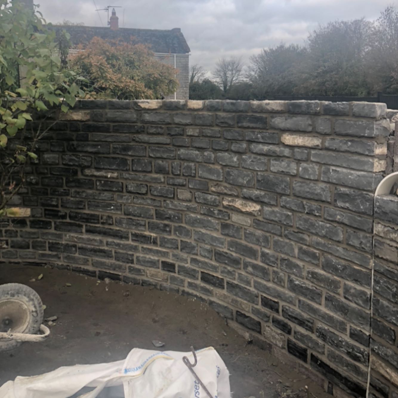 Curved stone wall